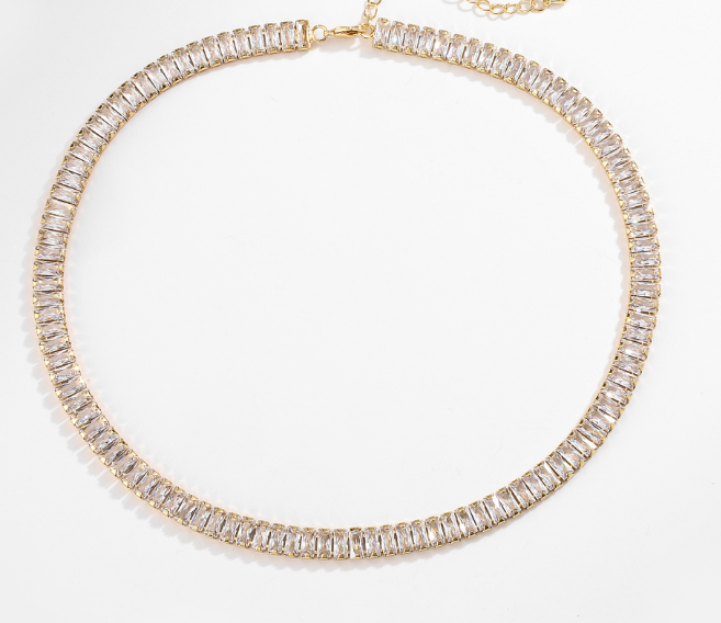 Lustre Gold Necklace in 18k real gold with crystals, shown on white background, highlighting its bold 6mm width and polished finish.