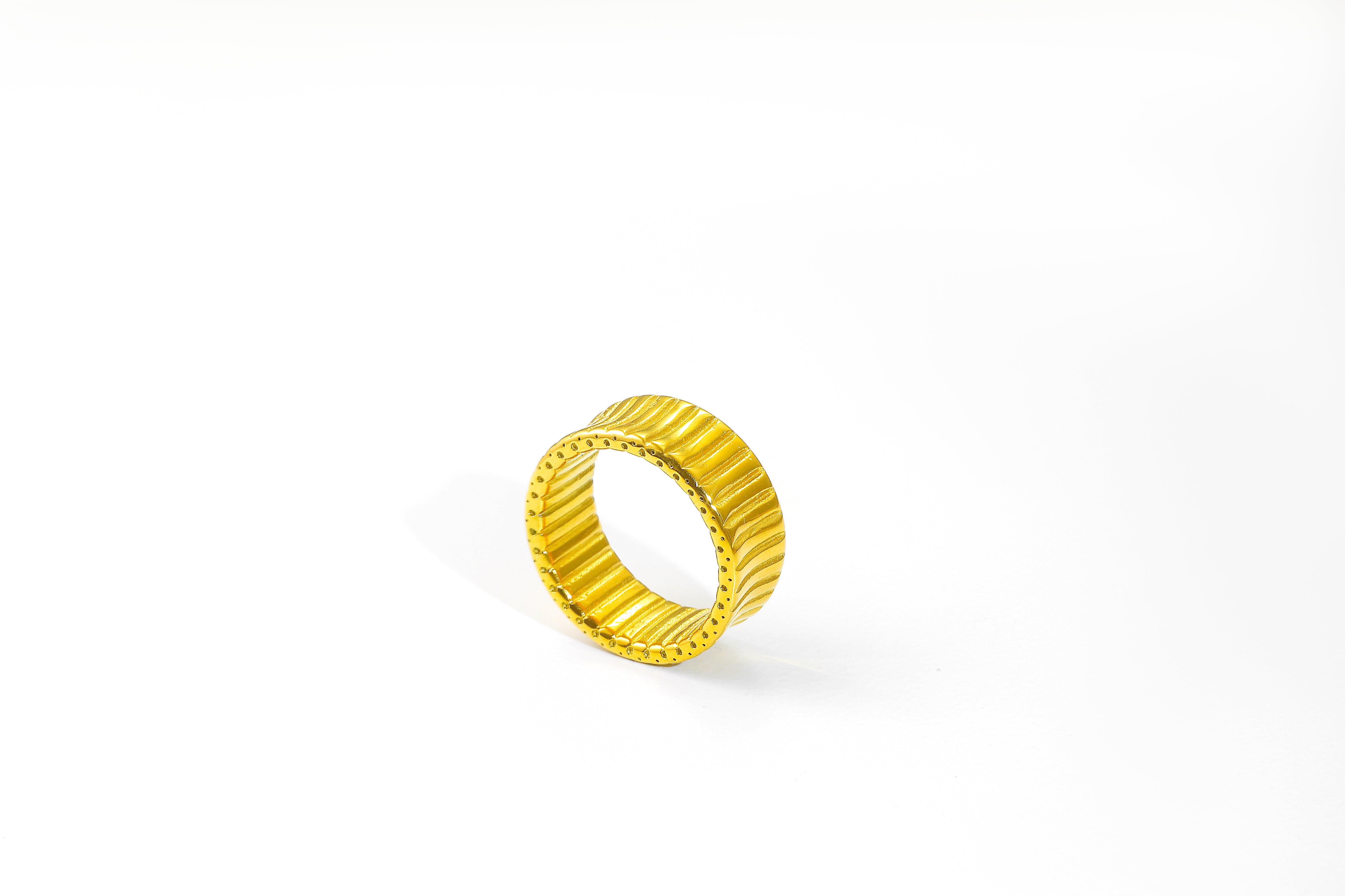 Cleo Ring in 14k real gold over stainless steel, displayed on white background, showing its polished finish.