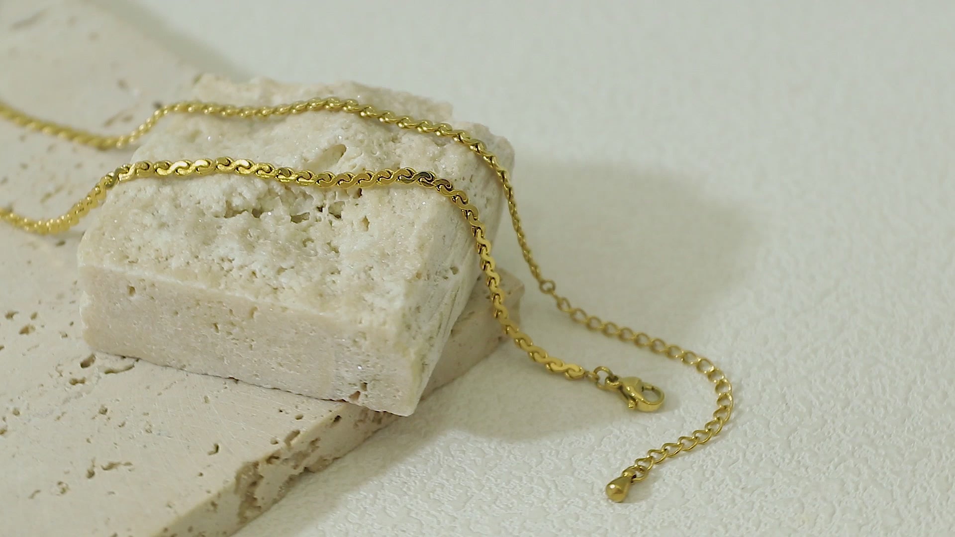 Close-up video of the Allure Gold Chain in motion, emphasizing its 18k gold plating, stainless steel base, and bold yet elegant design.
