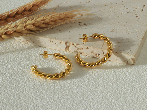 Poise Hoops - 14K Real Gold hoop earrings - Styled flat lay image 1