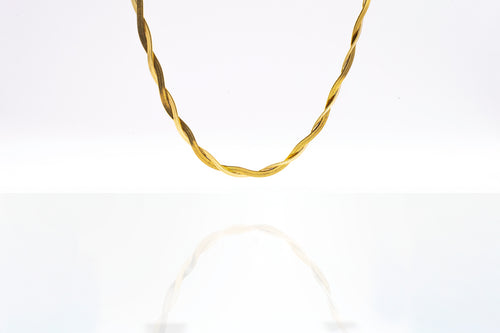 Close up of the Empress Gold Necklace displayed on a white background - 18k real gold finish and 40cm length