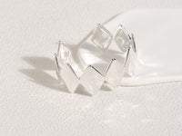 Edgy Silver Bracelet designed by Rebeca Sá