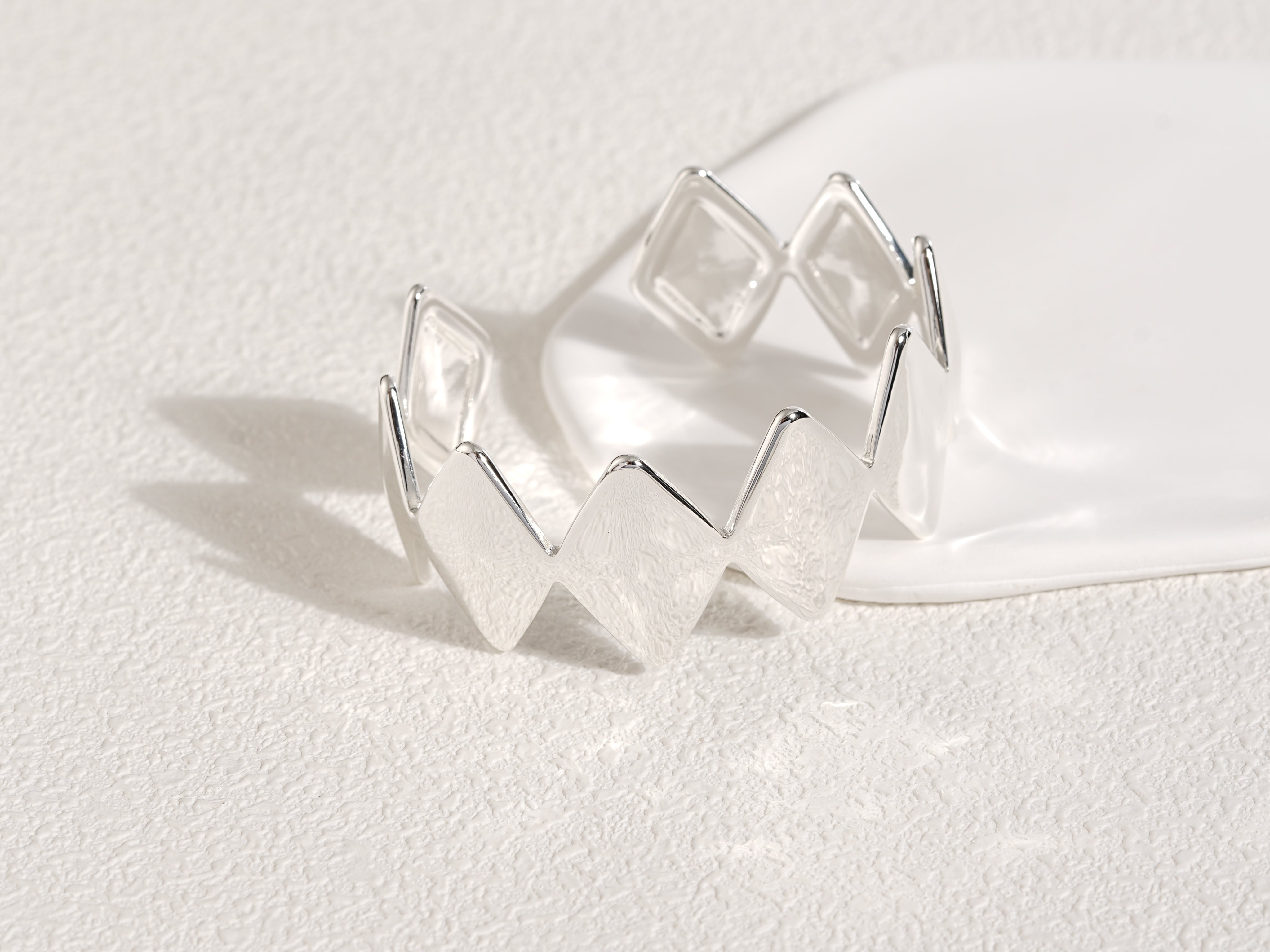 Edgy Silver Bracelet designed by Rebeca Sá