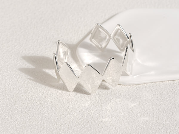 Edgy Silver Bracelet designed by Rebeca Sá