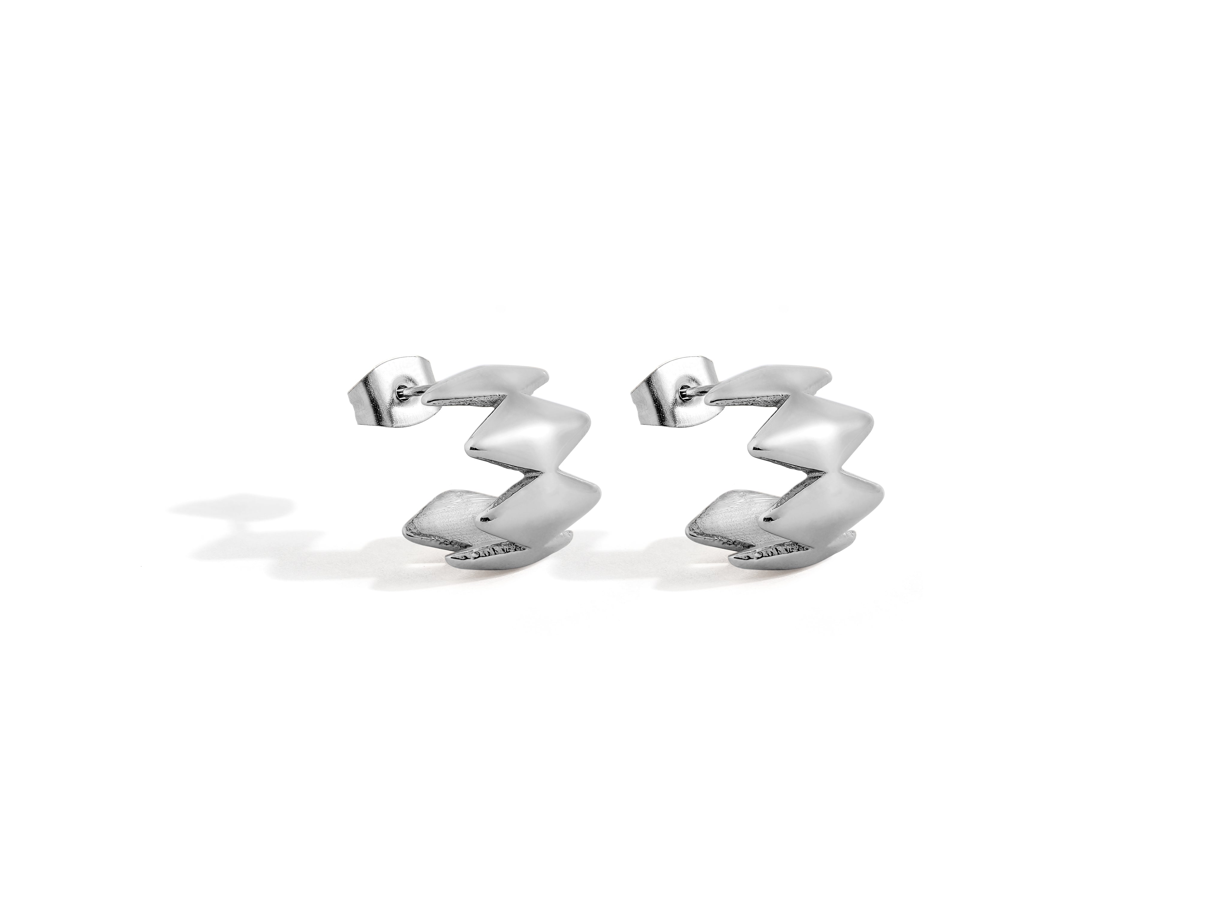 Edgy Silver Earrings, designed by Rebeca Sá