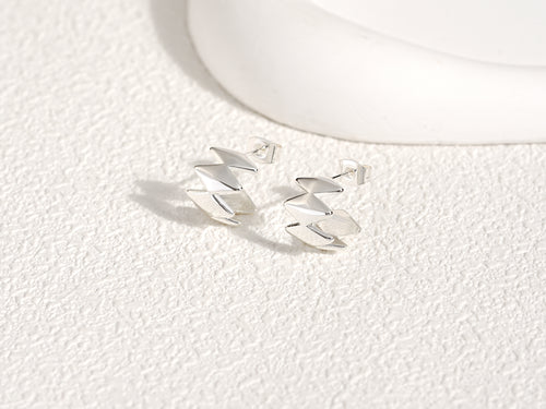 Edgy Silver Earrings, designed by Rebeca Sá