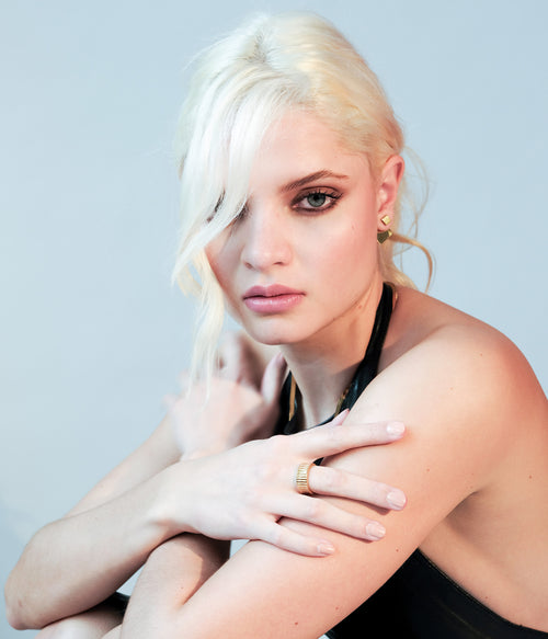 Side view of the Revolve Rhomb Earrings on a model - 18k gold earrings