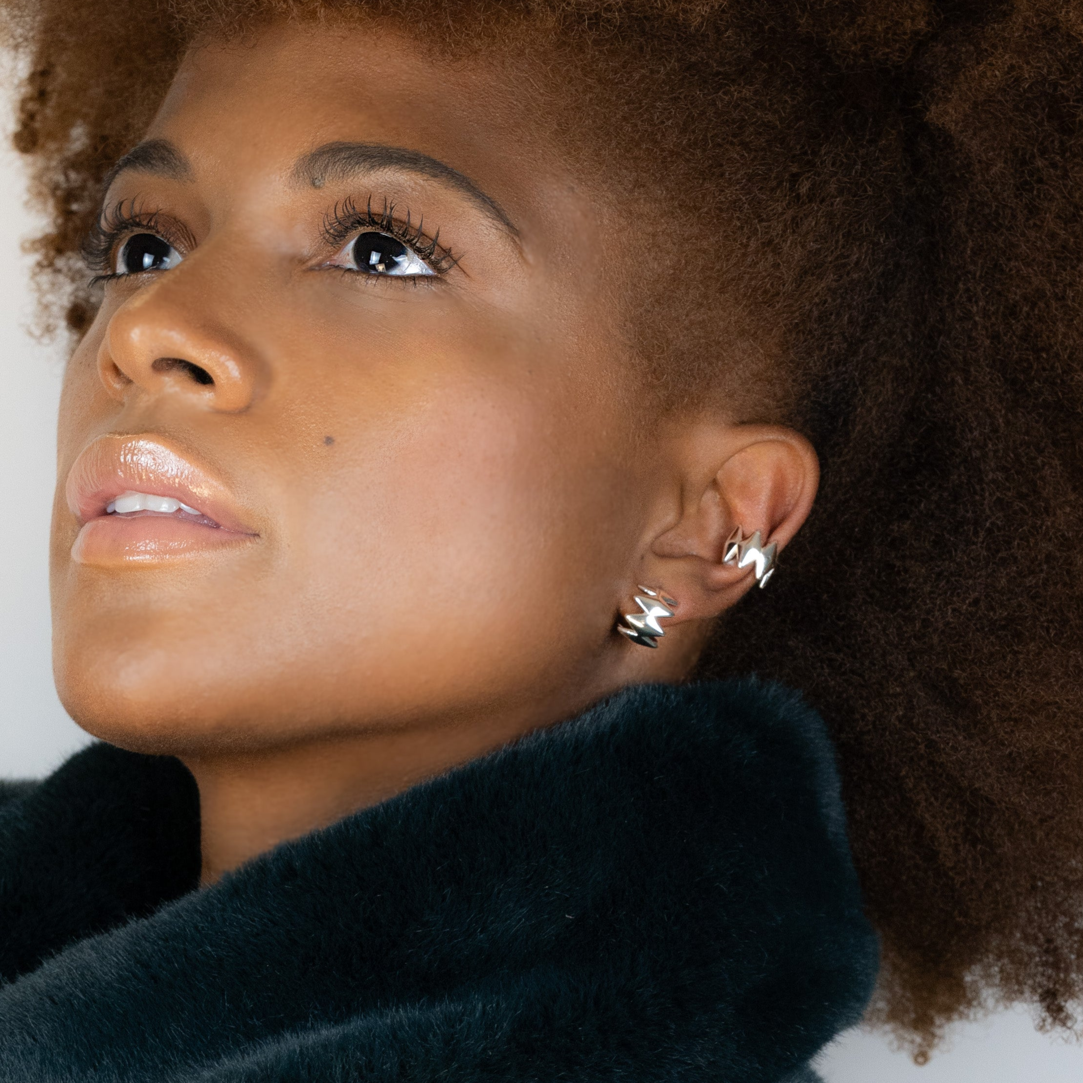 Edgy Silver Earrings, designed by Rebeca Sá