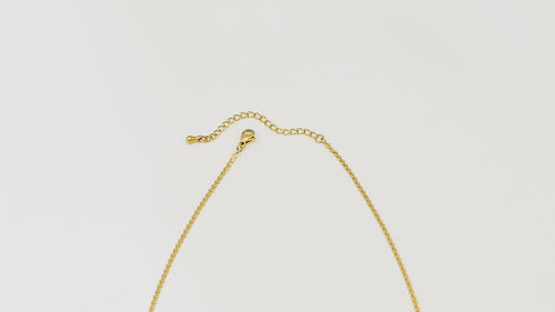 Top-down gold necklace video starting at the OT clasp and moving over the Allure Chain, showing its 1.8mm 14k gold links and smooth shine.