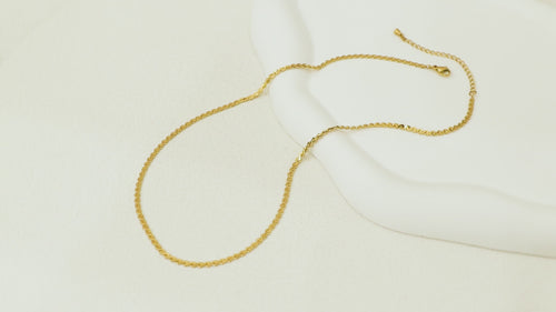 360° view of the Allure Chain rotating, showing the full gold link design, waterproof build, and stylish OT clasp.