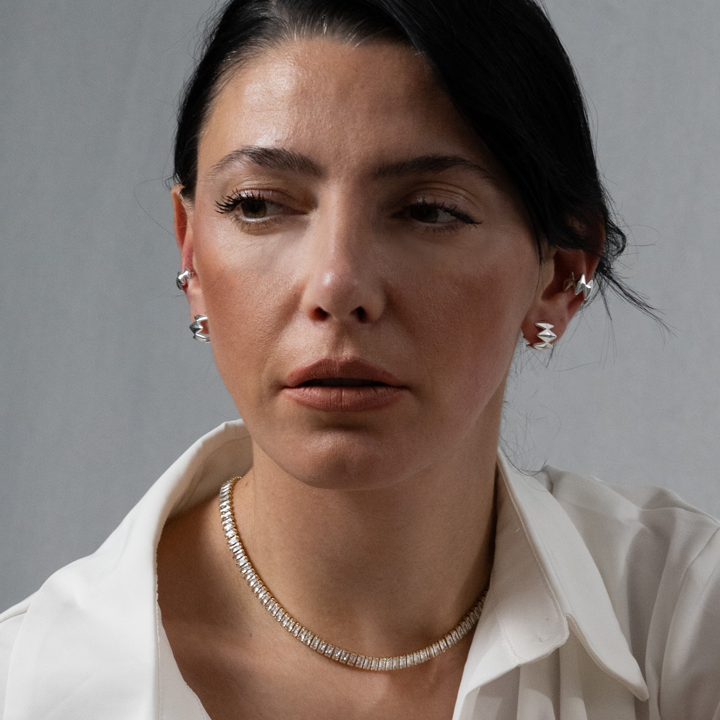 Edgy Silver Earrings, designed by Rebeca Sá